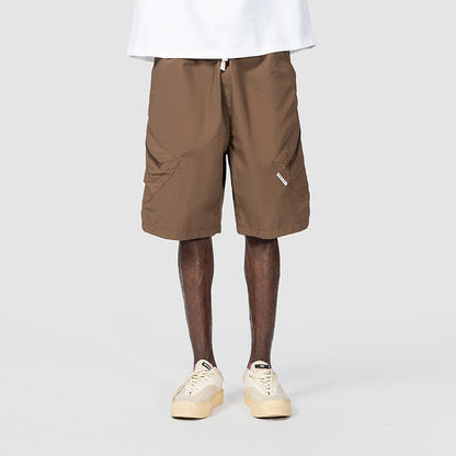 Man In The Street With Wide Leg Shorts