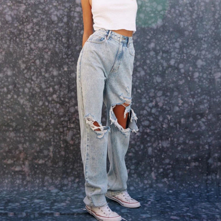 Ladies Jeans Ripped Holes Show Thin Denim